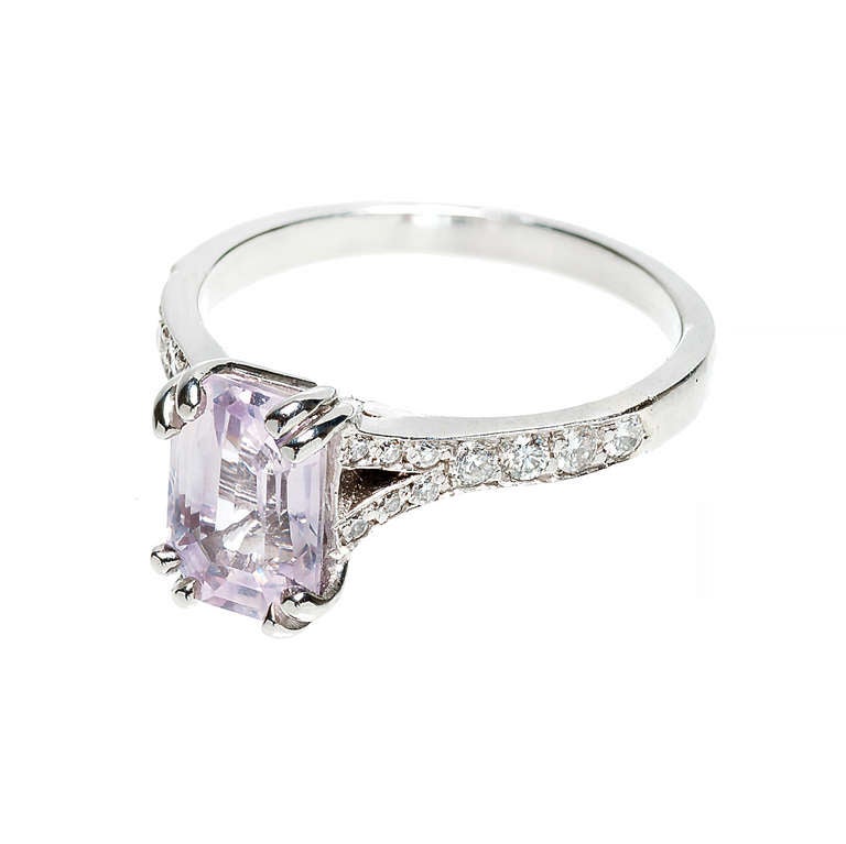 AGL certified # GB110063, 2.04ct natural emerald cut no heat no enhancements light pink Sapphire 8.52 x 5.72 x 4.14mm. Soft bright light pink with just a hint of purple.

One 2.04ct Natural Emerald Cut sapphire
20 full cut diamonds approx. total