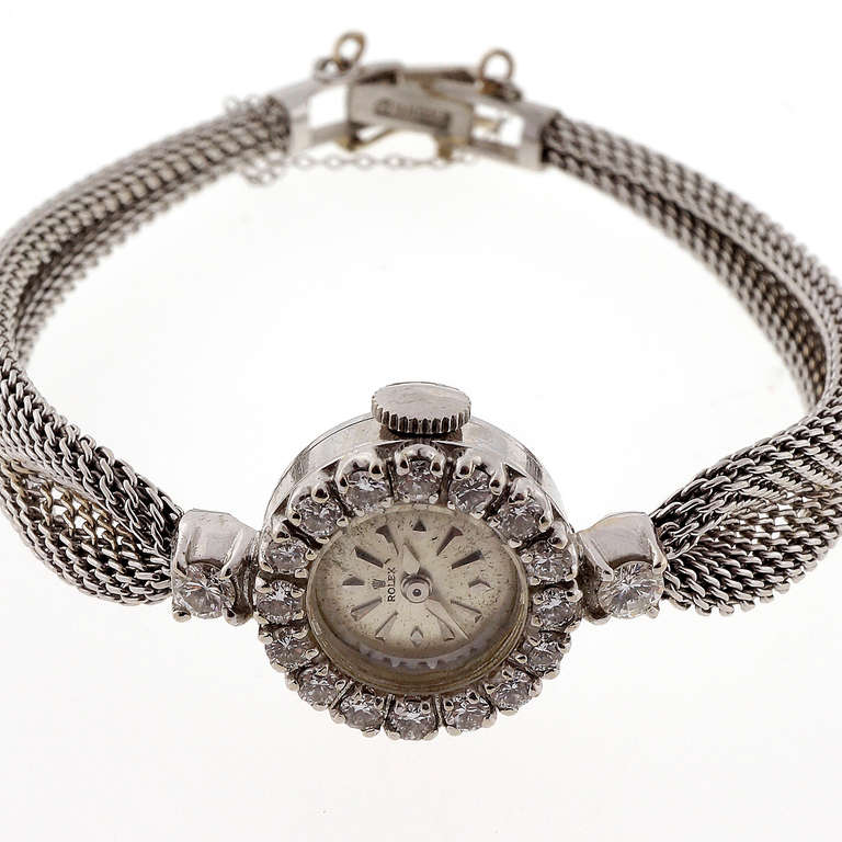 Rolex lady's 14k white gold and diamond bracelet watch, Ref. 6252, circa 1950s. Handmade gathered mesh band and diamond accents.

14k white gold 
20.5 grams
Length: 6 5/8 to 6 3/4 inches
Width without crown: 15.6mm
Width with crown:
