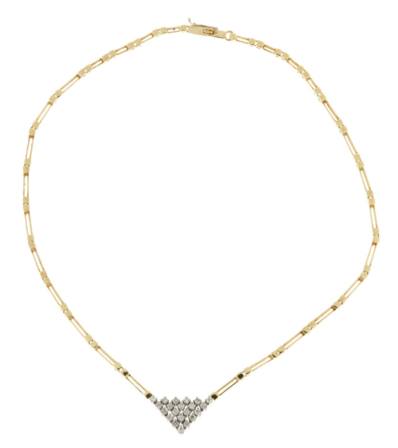 Beautifully hand assembled white & yellow gold necklace set with 21 round diamonds set into a triangular design with a 14k yellow gold handmade necklace.

21 round diamonds approx. total weight .65 cts G color, VS2- SI1 clarity.
14k Yellow