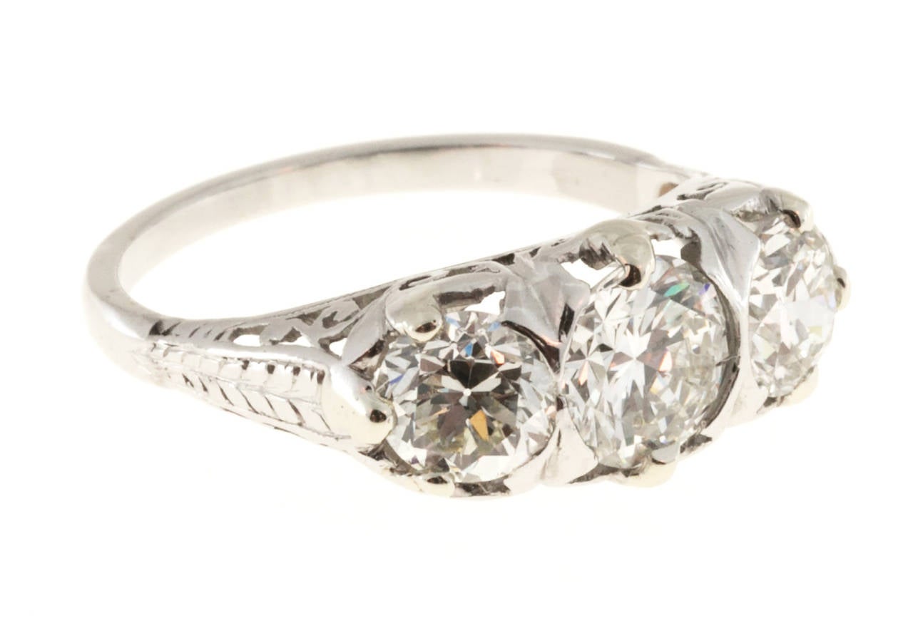Art Deco Three Stone Diamond Platinum Filigree Ring In Good Condition In Stamford, CT