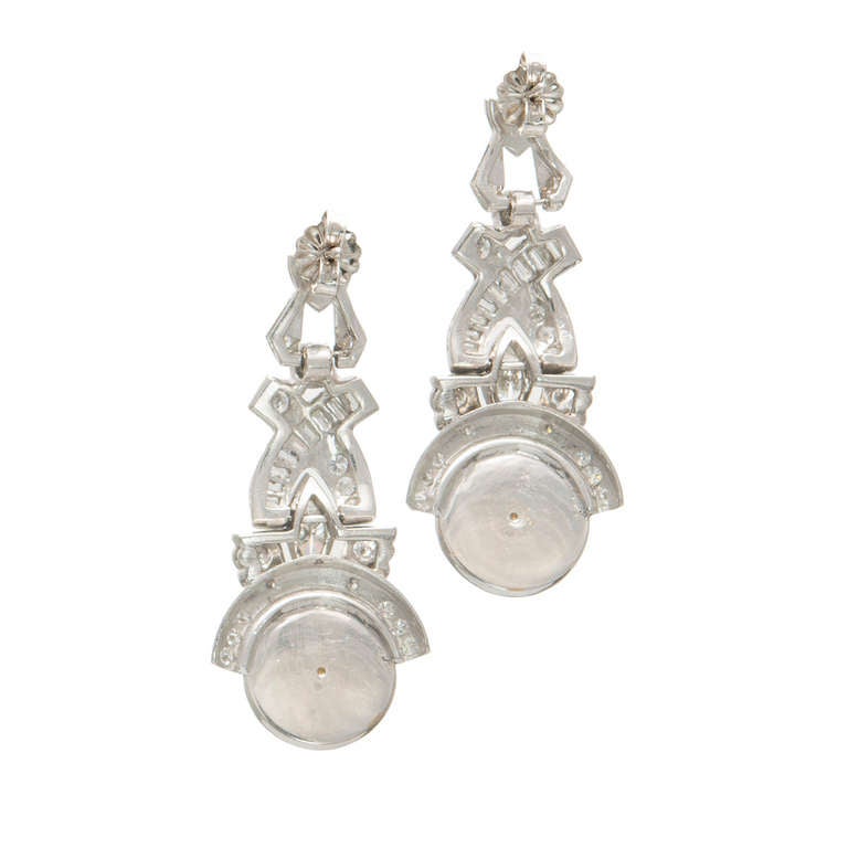 Many people ask me to point out when a very special vintage item comes across my desk, here comes one. 1935 Platinum dangle earrings with cushion cut high dome faceted natural no heat Aquas in simple solid back bezels. The effect is wonderful. When