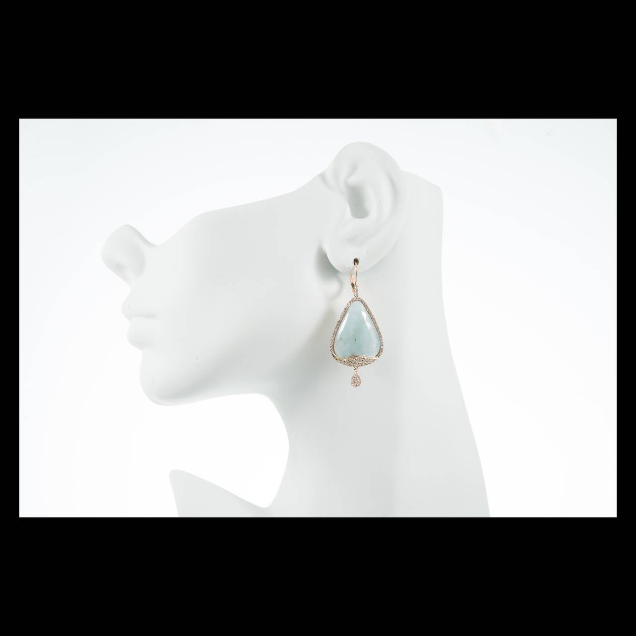 Meira T 14k pink gold beautiful dangle earrings with natural Aqua and nice sparkly diamonds.

2 light blue Aquamarine slices, approx. total weight 15.00cts, 24.62 x 19.17 x 4.69mm, mineral inclusions
148 round diamonds, approx. total weight