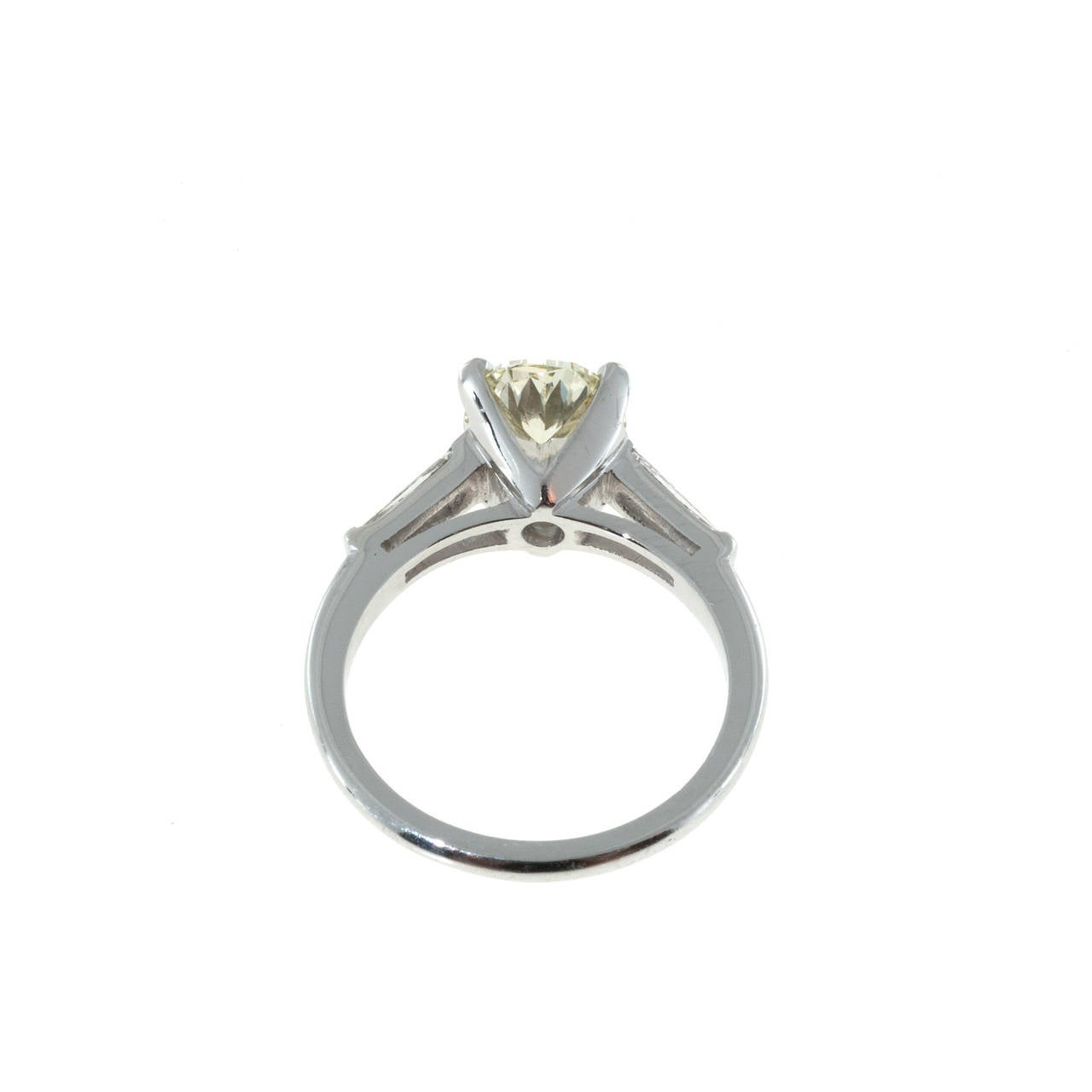 Oval Light Yellow Diamond Platinum Baguette Engagement Ring In Good Condition In Stamford, CT