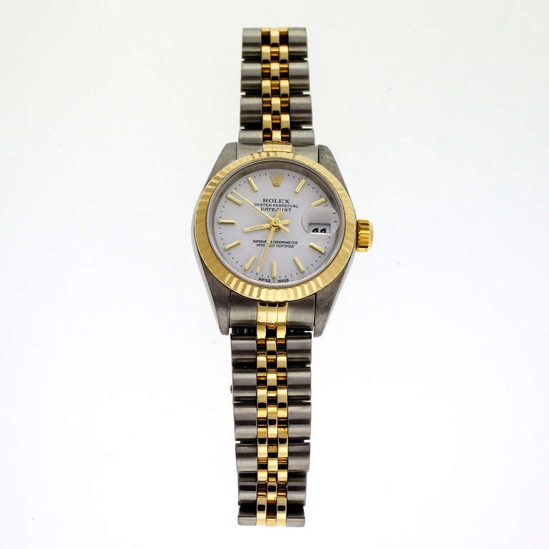 Rolex lady's stainless steel and 18k yellow gold Datejust wristwatch, Ref. 79173, circa 2001. White dial with gold markers. Stainless steel and 18k yellow gold Rolex Jubilee bracelet.

Stainless steel and 18k yellow gold
Bracelet length: 7 inches