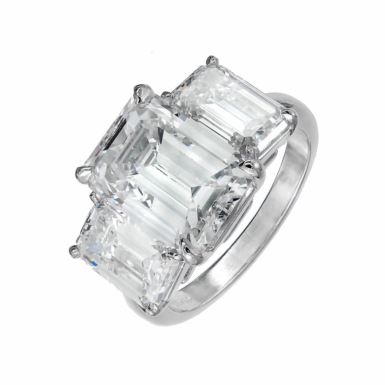 Important handmade Platinum ring set with three crystal clear extra sparkly Emerald cut diamonds. Well matched and unusually brilliant for Emerald cuts. Fresh GIA certificates.

1 Emerald cut diamond, approx. total weight 5.02cts, H, SI1, GIA