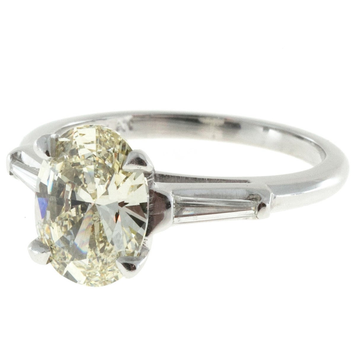 Oval Light Yellow Diamond Platinum Baguette Engagement Ring