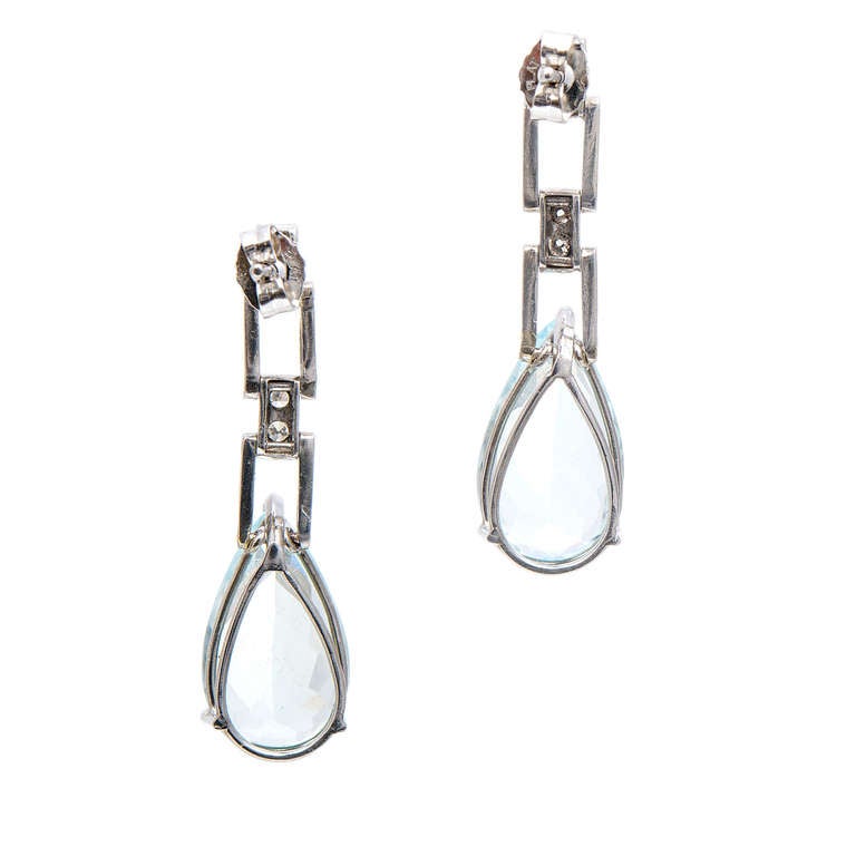 Handmade dangle earrings in Platinum with hinged open work links. Full cut diamonds and well polished natural bright sparkly Aqua.

Platinum 
2 natural light greenish blue pear Aqua, approx. total weight 9.15cts, VVS - VS, 16.5 x 6.85mm, untreated