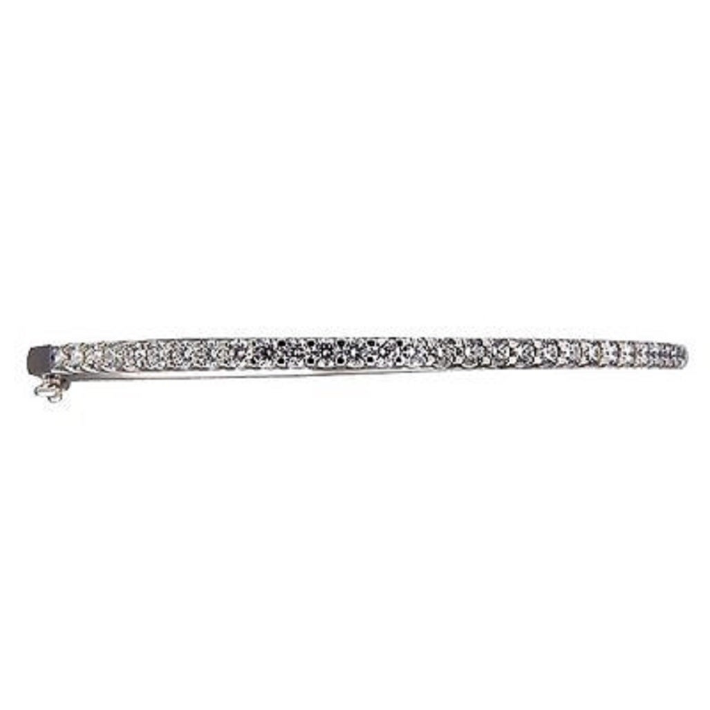 Diamond White Gold Hinged Oval Bangle Bracelet Solid die struck construction hinged bangle bracelet with patented push button catch and side lock safety. Common prong set Ideal cut diamonds.

30 Ideal full cut diamonds approx. total weight