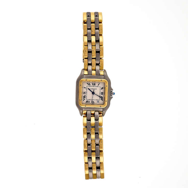 Cartier stainless steel and 18k yellow gold Panther wristwatch with date. The bracelet has three rows of gold and two rows of steel. 

Stainless steel and 18k Yellow Gold
Length: 7.25 inches
Top to bottom: 36.30mm
Width without crown: