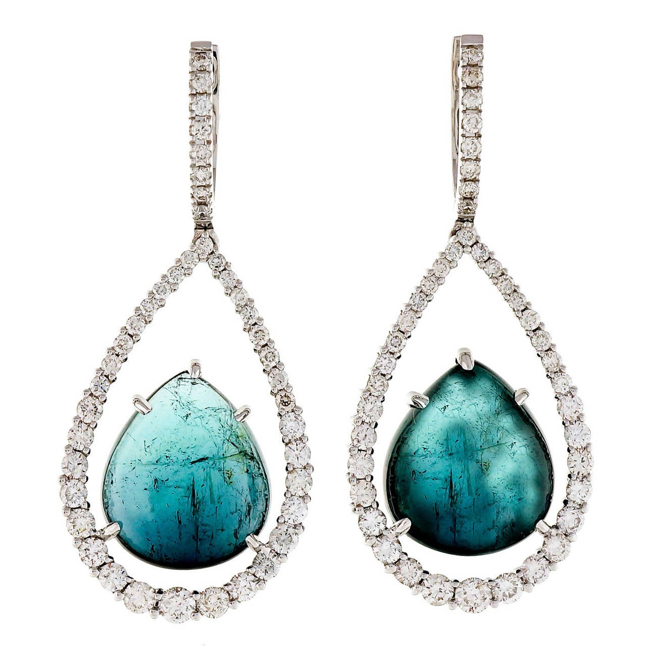 Peter Suchy Drop diamond open pear shaped earrings with post diamond hoop tops and sparkly full cut diamonds with natural blue pear shaped Tourmaline centers.

2 cabochon pear greenish blue Tourmaline, approx. total weight 15.84cts, VS – SI
84 round