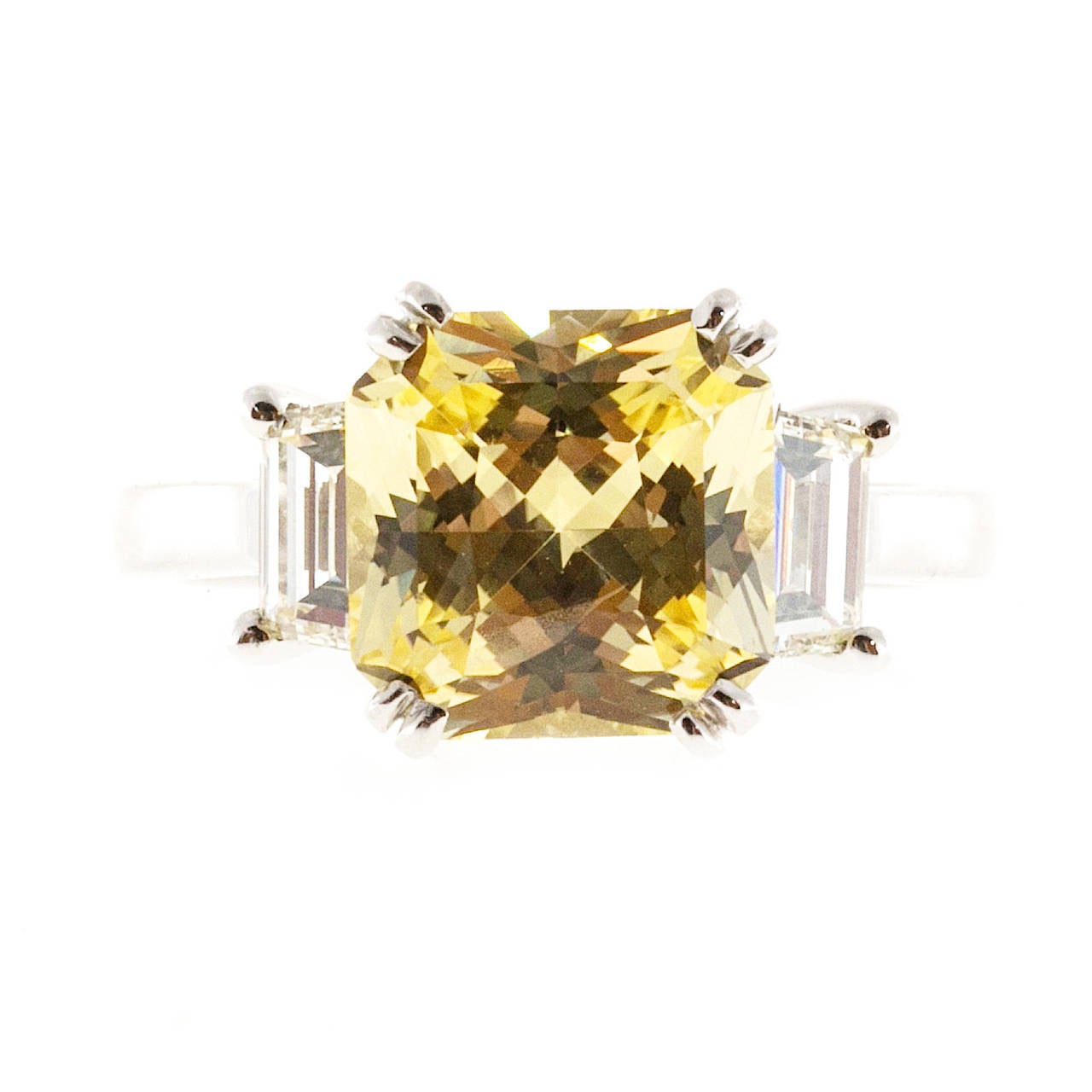 Canary yellow original square emerald cut genuine 4.09 natural color no heat sapphire certified by the AGTA as natural corundum. No indications of heating. 9.32 x 9.31 x 5.56mm octagonal shape. This stone has fantastic end to end brilliance caused