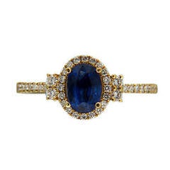 Bright Oval Sapphire Diamond Halo Gold Engagement Ring