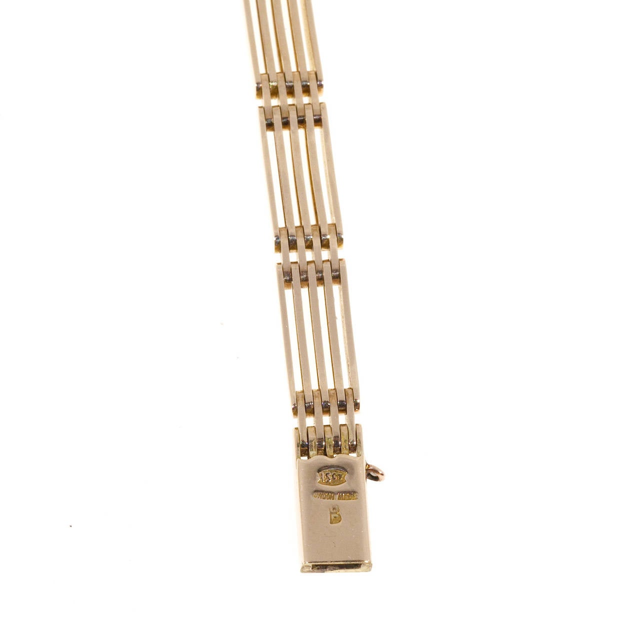 Vintage 15.00ct handmade pink gold bracelet .

15k Pink gold
15.4 grams
Stamped: 15ct
Hallmark: D Hand Made
Length: 6 7/8 inches
Width at top: 5.48mm
Width at Bottom: 5.48mm
Depth: 2.35mm