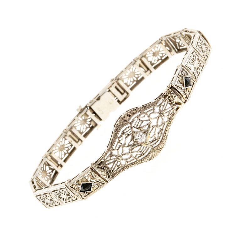 Diamond Calibre Sapphire White Gold Filigree Bracelet For Sale at