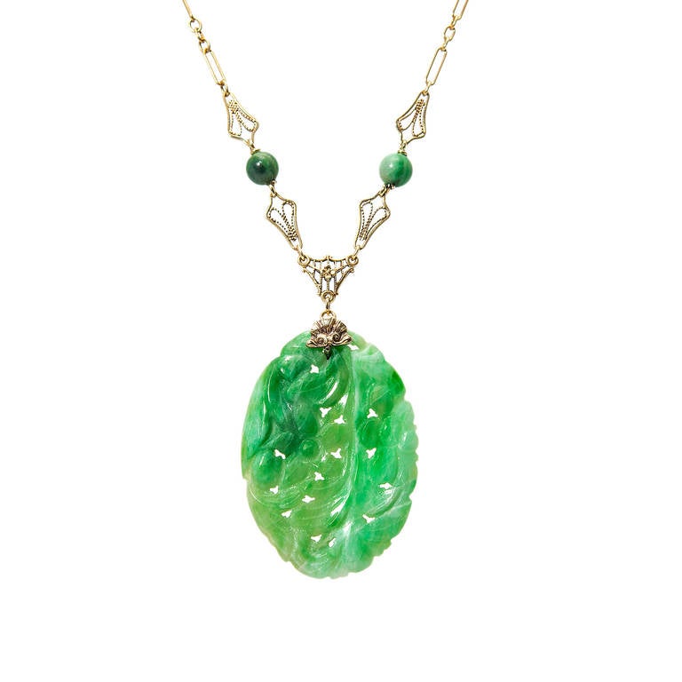 Schöne handgefertigte 1930 offene Arbeit natürlichen grünen Jadeit Jade geschnitzt Anhänger. 14k Gelbgold. GIA-zertifiziert, ganz natürlich, keine Veredelungen.  Sieht toll aus am Hals.

14k Gelbgold
1 natürlicher, grün gesprenkelter,