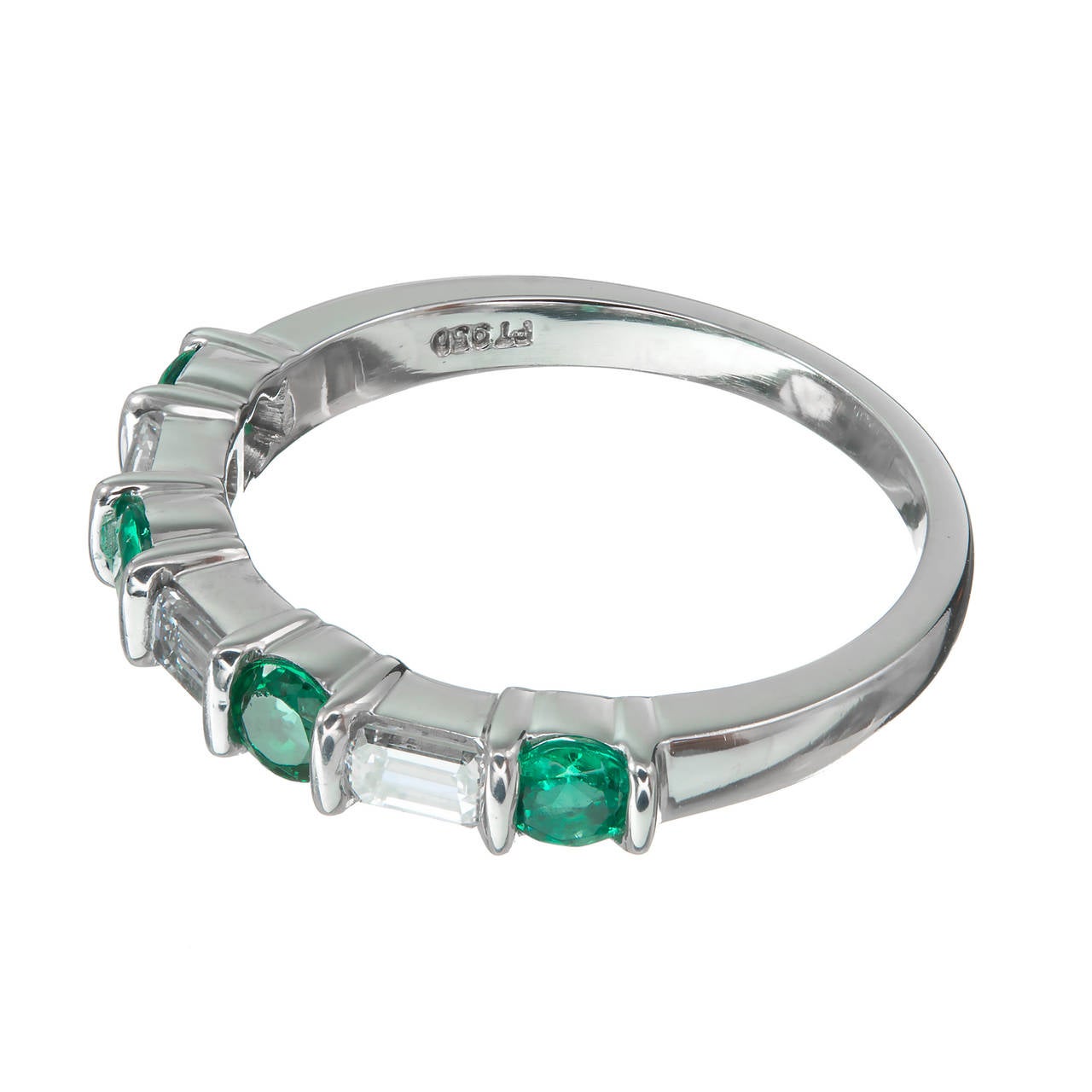 Beautiful vintage 1960’s bar set Tiffany & Co wedding band with correct old deep stamps and top quality gemstones. Shows almost no wear. Everything is well polished and sparkly.

4 round bright green Emeralds, approx. total weight .46cts, VS, 3mm