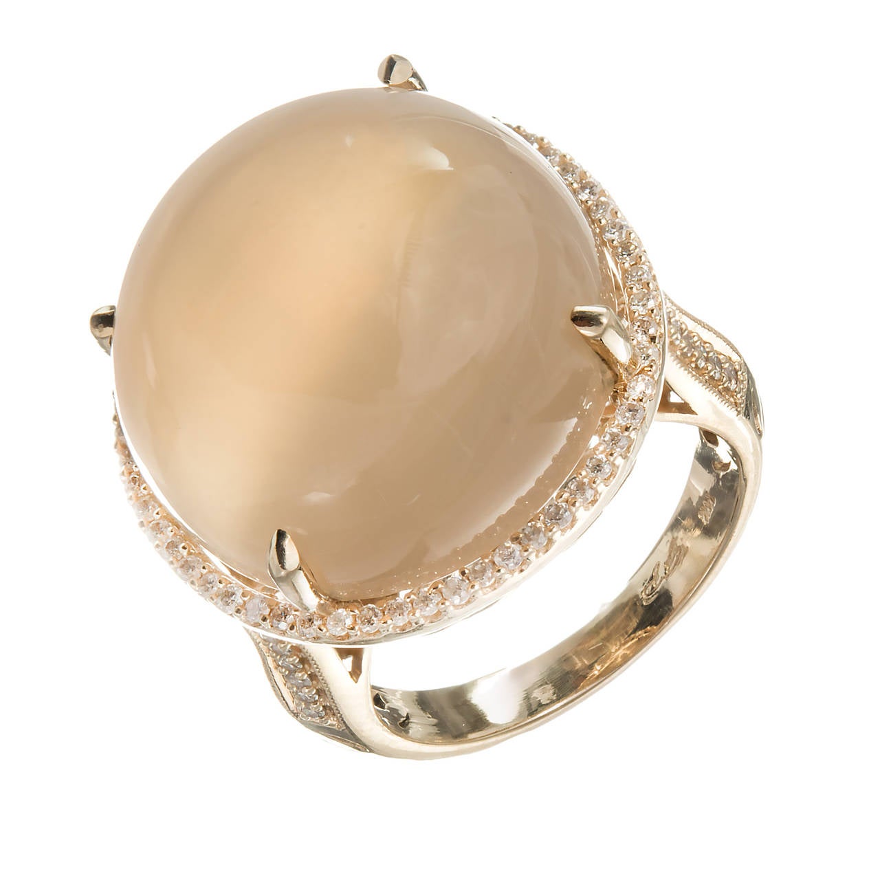 Handmade ring signed by the maker GP hand bead set with 114 full cut sparkly diamonds, hand engraved shank and heart gallery. The center is set with a one of a kind natural translucent peach color Moonstone.

1 round cabochon peach Moonstone,