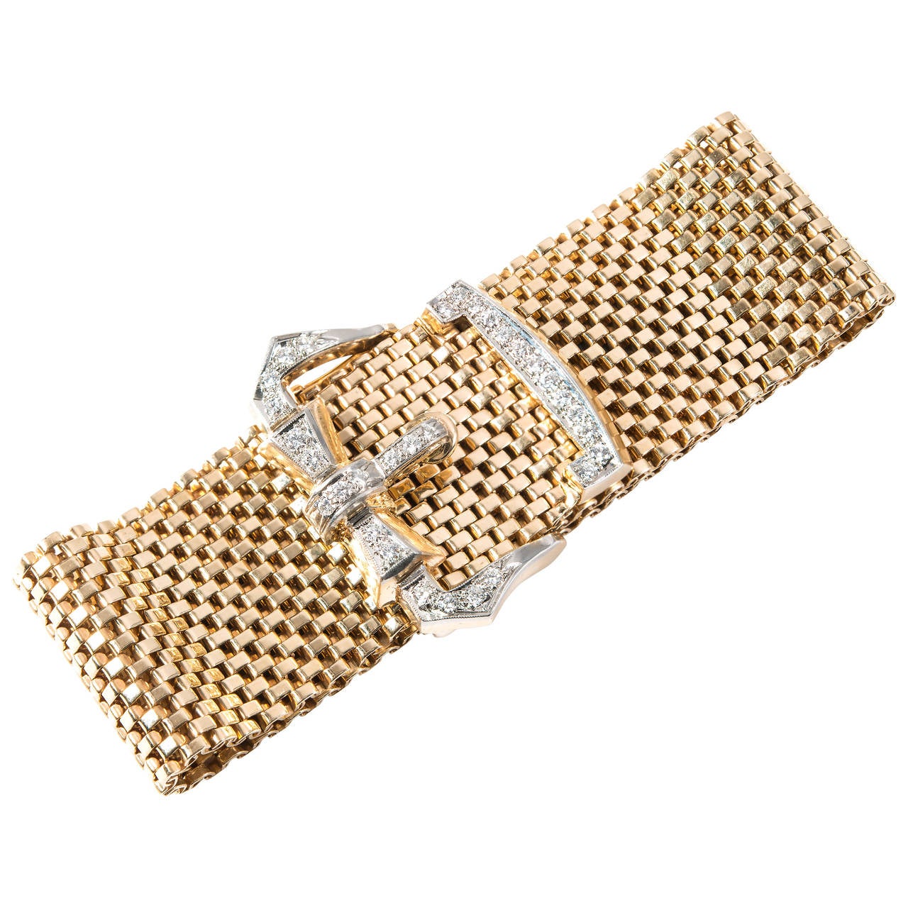 1940's Wide mesh diamond 14k yellow and white gold bracelet with hinged buckle and white gold diamond catch. 

31 round full cut diamonds, approx. total weight .80cts, G – H, VS
14k yellow gold
Tested: 14k
Stamped: Not
75.3 grams
Width at top: