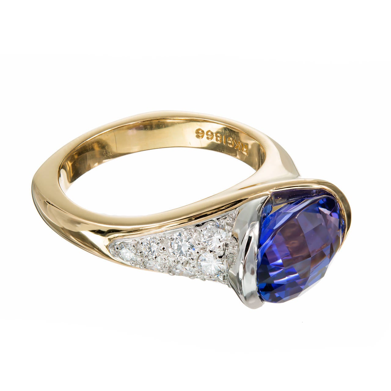 Rare Richard Krementz top fine custom cut gem Tanzanite 4.26ct 18k yellow gold Platinum ring with fine full cut diamonds. Super bright oval faceted top Tanzanite. Before they closed Richard Krementz was known for cutting and setting some of the