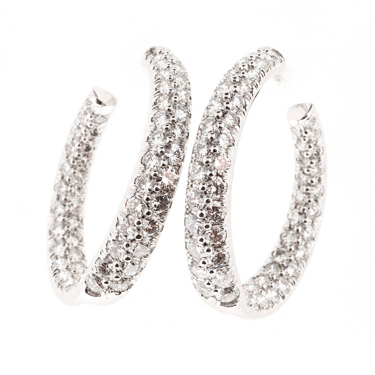 Kurt Wayne 3.50ct diamond inside out hoop earrings. Solid Platinum inside out slightly simple twist design hoop earrings. Platinum earring backs.

112 Ideal full cut diamonds, approx. total weight 3.50cts, E – F, VS1 – VS2
Tested: Platinum
Stamped: