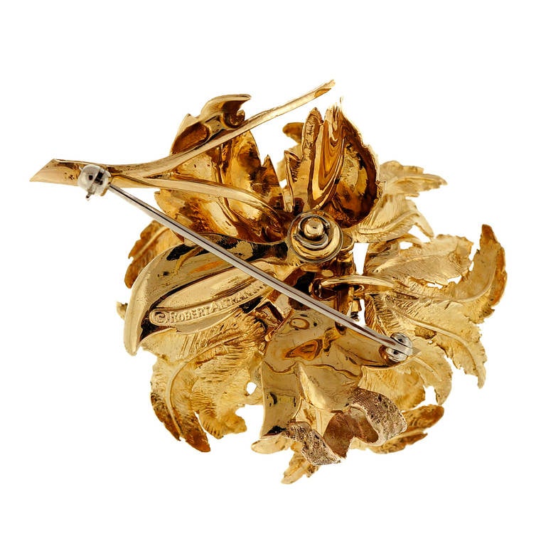 Robert Altman 1950 14k Yellow Gold En Tremblant Flower Pin
Authentic Robert Altman authentic En Tremblant flower pin with stones that move and a flower that opens and closes by pushing the leaf marked Robert Altman. All hand textured.

14k yellow