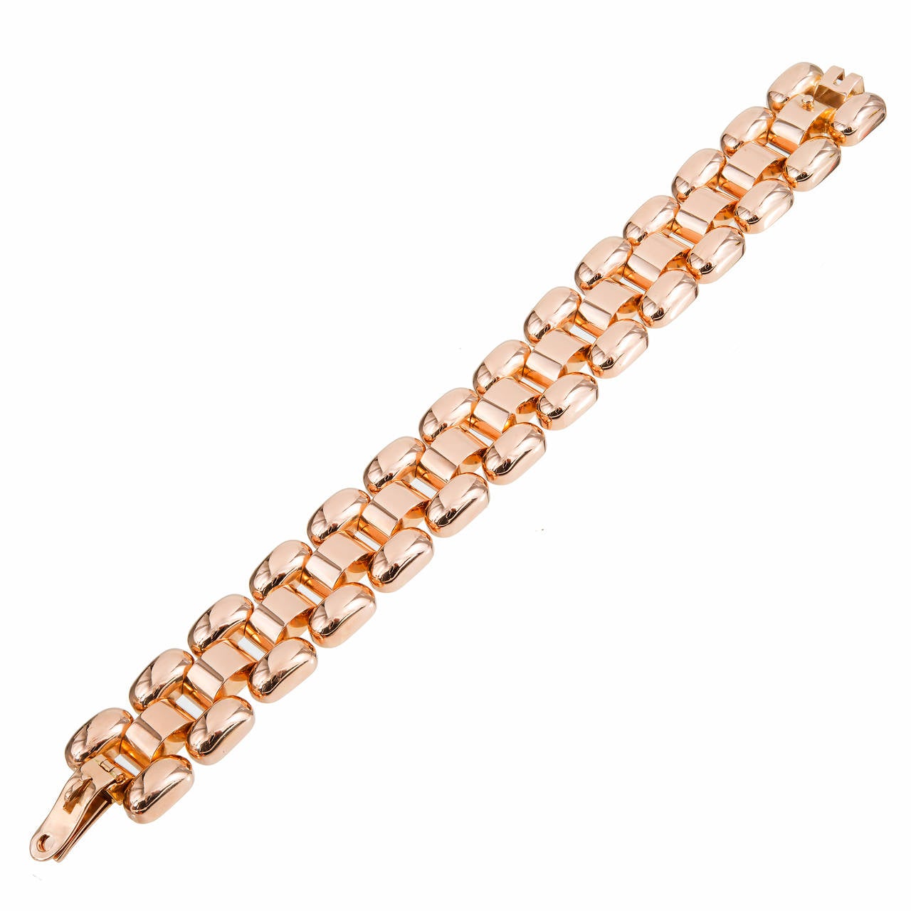 Heavy 18k pink gold Retro bracelet. Hidden built in catch. Top side fold over safety. Hallmark we do not recognize. On a Rose gold scale of 1 to 10 with 10 as the deepest pink this scores an 8.5.

18k pink gold
83.4 grams
Tested: 18k
Stamped: