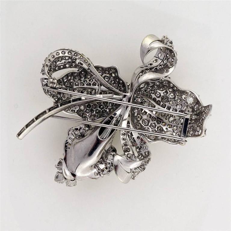Important signed Meister 194-1950 3 dimensional flower pin with high quality fine white diamonds. This is one of the finest Meister pieces to come to the market in years.  Double secure pin stem.  A chain can pass behind the pin for a