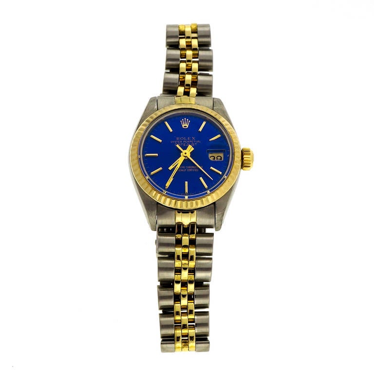 Rolex lady's stainless steel and yellow gold Datejust wristwatch, Ref. 6917, circa 1980s. Rolex dial refinished in a bright shiny blue. After-market sapphire crystal. Completely serviced. 

Stainless Steel and Yellow Gold
Bracelet length: 6.75