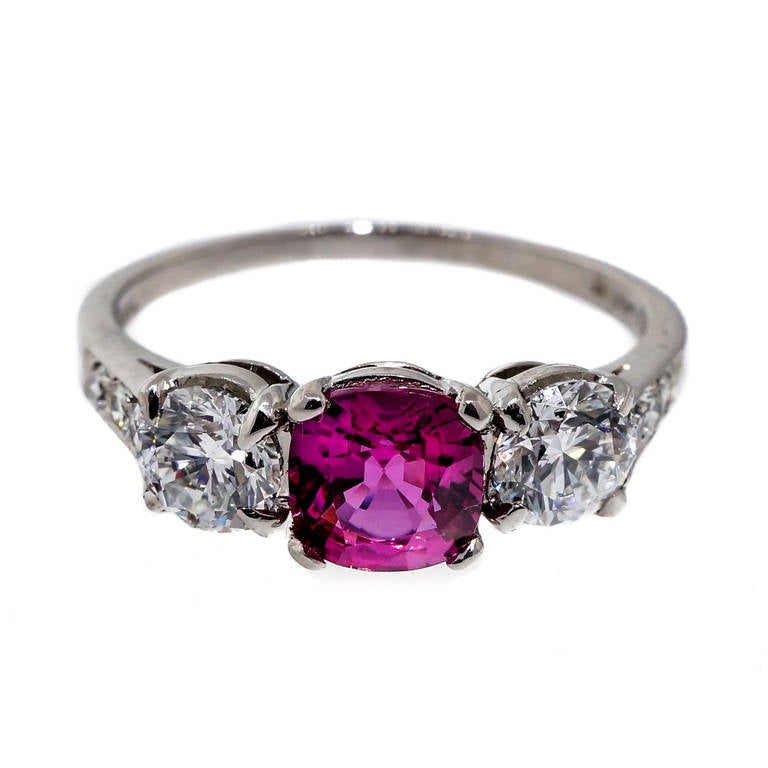 Natural world class top gem hot pink cushion Sapphire, one of the brightest and best we have ever seen. It is set in an original 1940's Tiffany jewel correctly stamped and made 1940-1945 in 950 Platinum when Platinum was used for the War effort. The