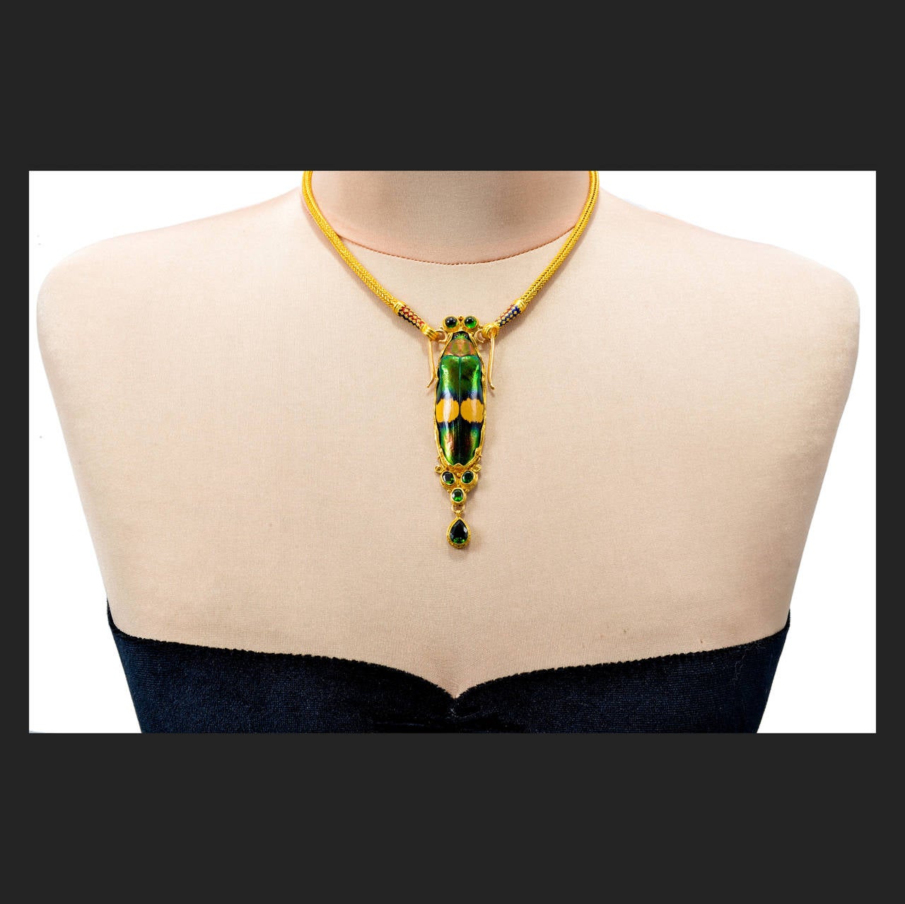 Totally handmade rare Scarab and Tourmaline necklace from the famous goldsmith Luna Felix. Large shiny green Scarab and gem green Tourmalines. Fine granulated all around. At the top on each side is a hook to attach to a chain or pearls with a loop