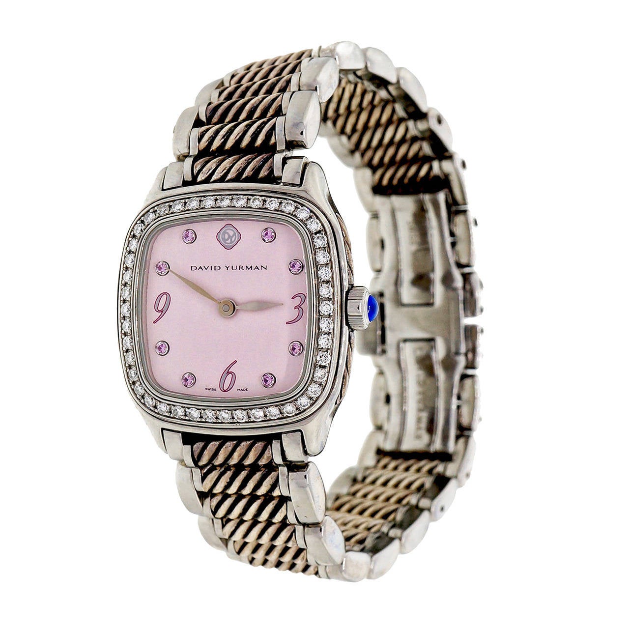 David Yurman Lady's Stainless Steel Diamond and sapphire. Thoroughbred Wristwatch, quartz movement

Stainless steel
Bezel 45 full cut diamonds
Dial: 8 pink Sapphire
Length: 31mm
Width: 26mm
Case thickness: 7.41mm
Bracelet width at case: