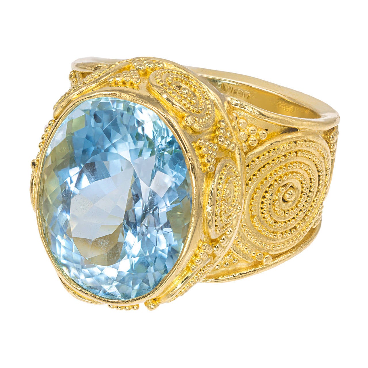 Bright well-polished blue 9.41ct aquamarine set in a handmade setting with fine rare granulated and wire work in 22k and 18k yellow gold. Signed and appraised by Luna Felix. 

1 oval extra bright greenish blue gem quality Aquamarine, approx. total