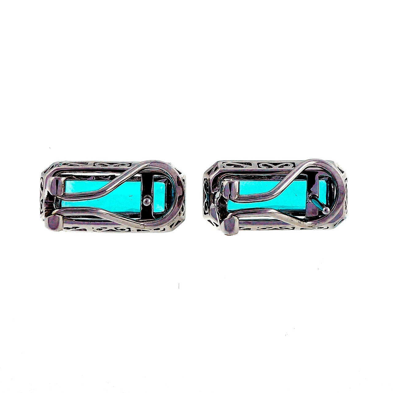 Exceptional bright blue Topaz 14k white gold earrings with diamond frames, clip post style. Designer SB. Circa 1970.

2 rectangular cut bright blue Topaz, approx. total weight 6.00ct, VS, 14 x 5mm
68 single cut diamonds, approx. total weight