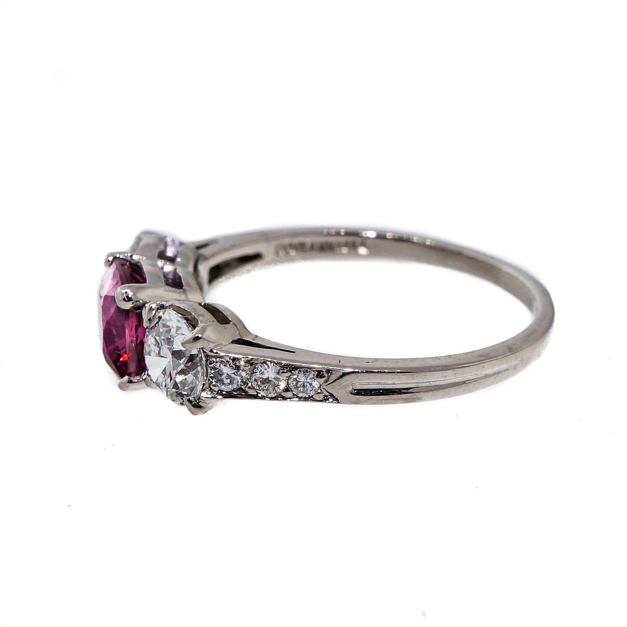 Natural world class top gem hot pink cushion Sapphire, one of the brightest and best we have ever seen. It is set in an original 1940's Tiffany jewel correctly stamped and made 1940-1945 in 950 Palladium when Platinum was used for the War effort.