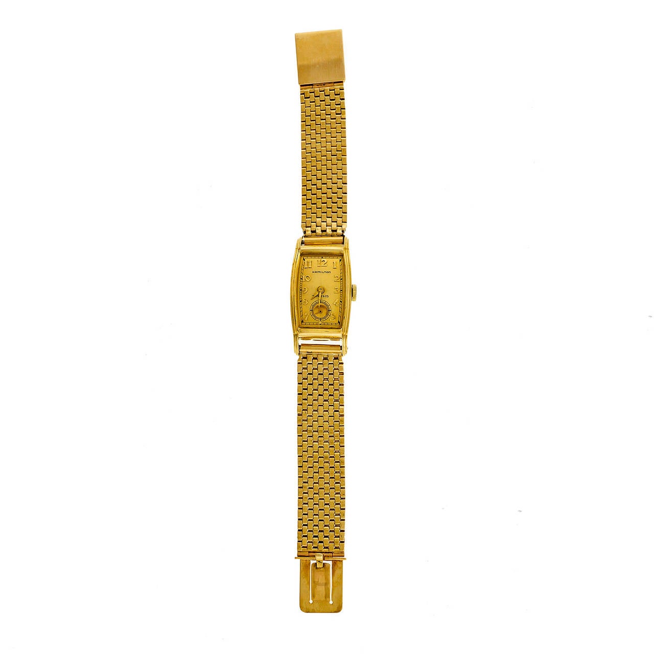 Hamilton Yellow Gold Tonneau Wristwatch, Retailed by Tiffany & Co., circa 1940s, with associated 14k yellow gold mesh bracelet.

14k yellow gold 
Length: 40.44mm 
Width: 20.75mm
Case thickness: 8.75mm 
Bracelet length: 7.25 inches 
Bracelet