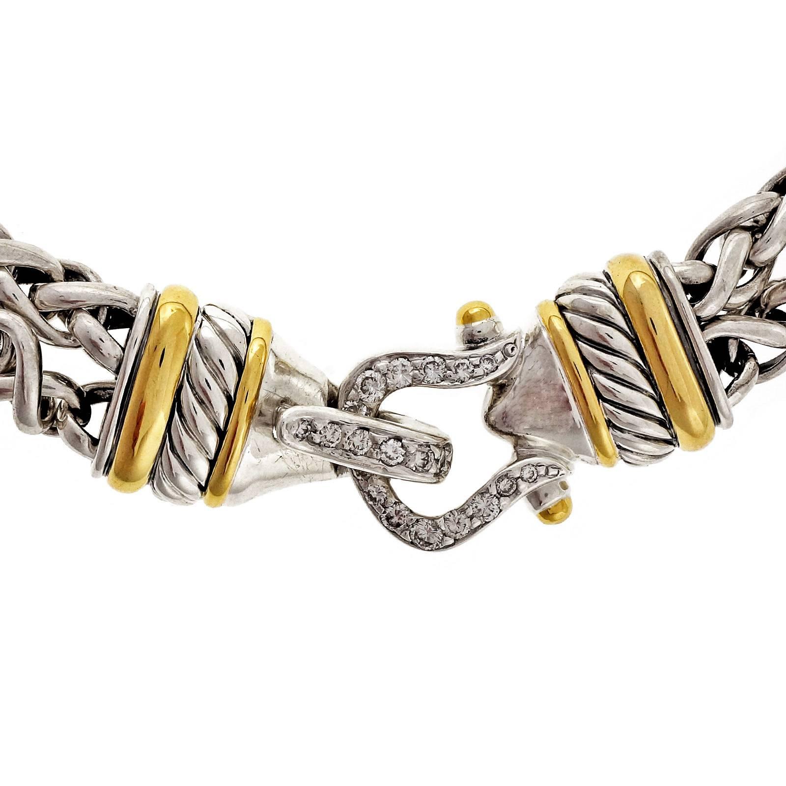 David Yurman diamond clasp silver & 18k yellow gold necklace. 2 rows 6mm wheat chain.

20 round diamonds approx. total weight .40cts, H, SI
925 silver and 18k yellow gold
Tested: 18k and silver
Stamped: 925 750
Hallmark: © D. Yurman
Length: