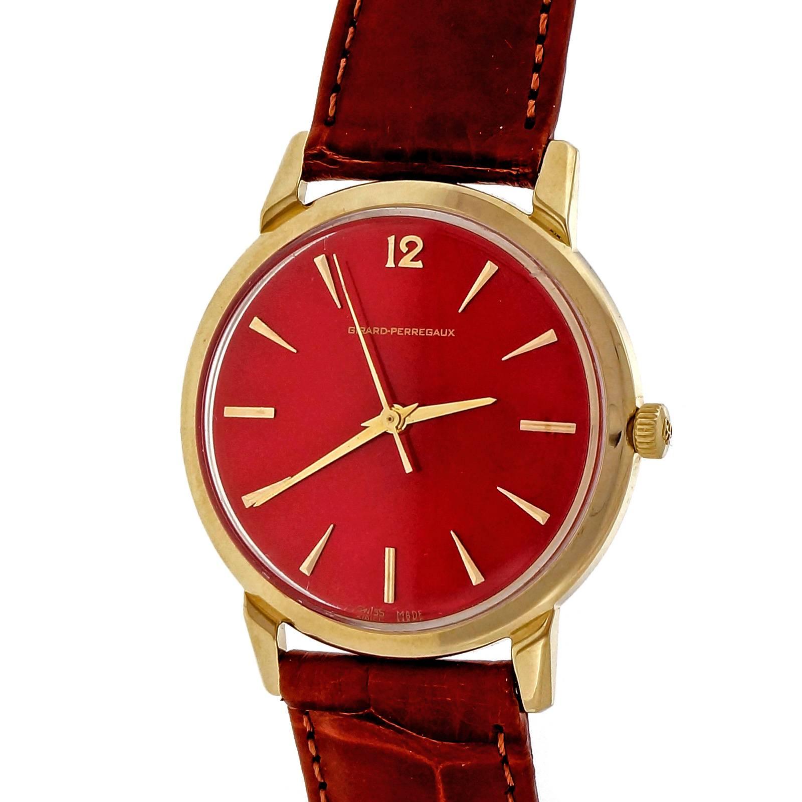 Vintage 1960’s self-wind Girard Perregaux solid 14k gold. Classic clean look round wrist watch with original dial custom refinished and custom colored in a special bright shiny red by Peter Suchy. Multiple layer high luster process.

14k yellow
