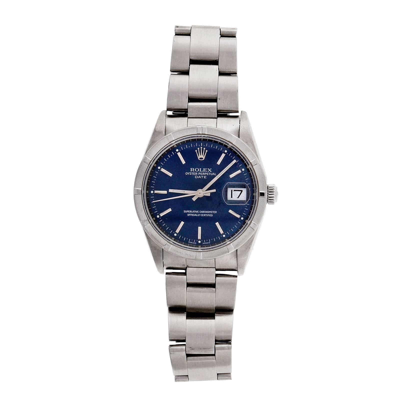 1999 Rolex Oyster Perpetual Date with factory original blue dial and oyster band.

Steel
93.1 grams
Length: 7.5 to 7.75 inches
Length: 42mm
Width: 34.4mm
Band width at case: 14mm
Case thickness: 12.1mm
Band: Oyster Rolex 78350 X8
Crystal: