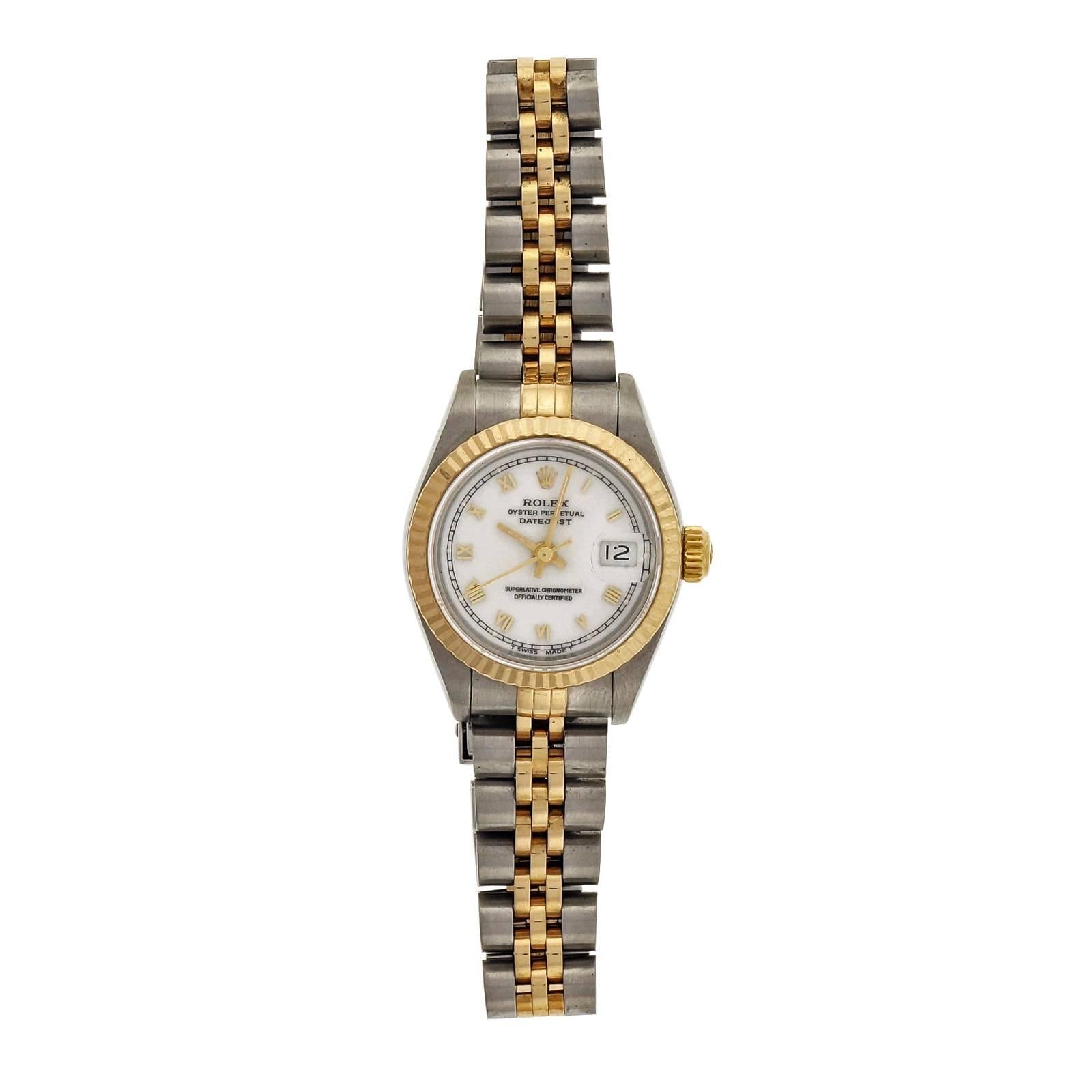  All original 1996 ladies Datejust 69173 18k yellow gold and steel watch, Jubilee band, white dial with Roman numerals. Original box and papers. Circa 1996.

18k yellow gold and steel 
57 grams 
Length: 33mm 
Strap length: 7.5 inches 
Width: