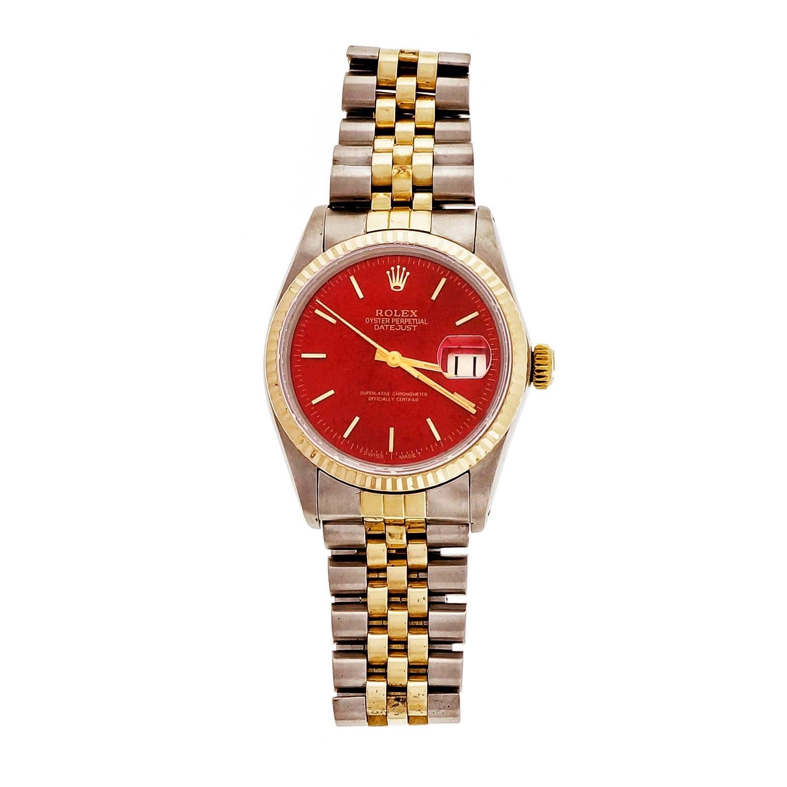 1981 Rolex Datejust, serviced. Original Rolex dial custom refinished with multiple layers of Ferrari red high luster finish by the Peter Suchy workshop. Gold markers and hands are original. 1981 original warranty papers.

18k yellow gold,