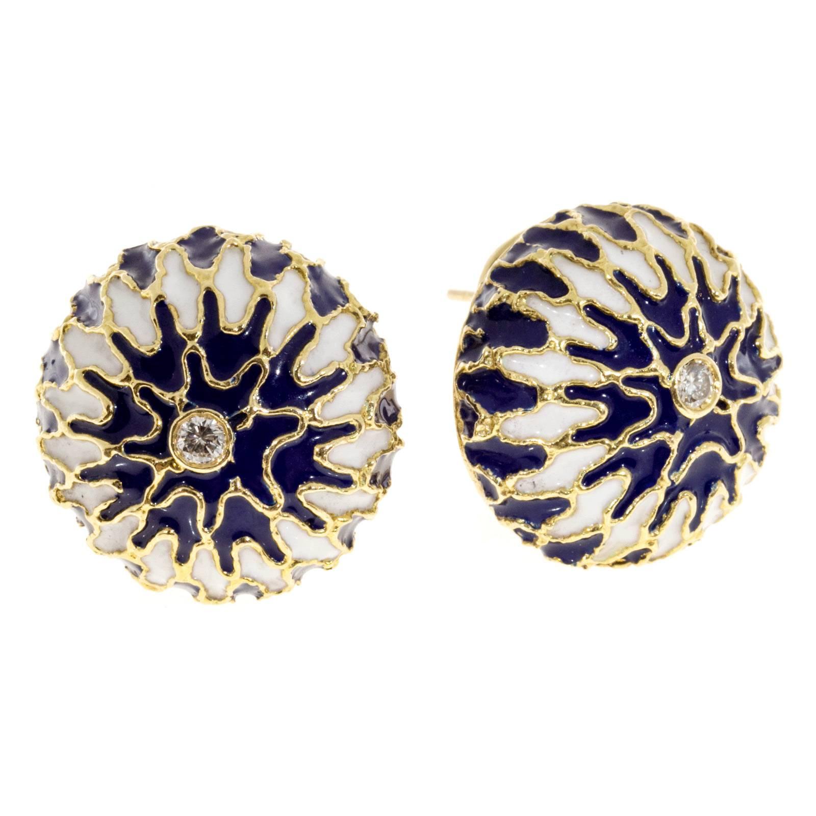 1950's high domed diamond and enamel earrings. 18k yellow gold with blue and white enamel. 2 round center diamonds. Clip & post style.

2 round diamonds, approx. total weight .24cts, H, VS2
18k yellow gold
Tested and stamped: 18k
28.8 grams
Top to
