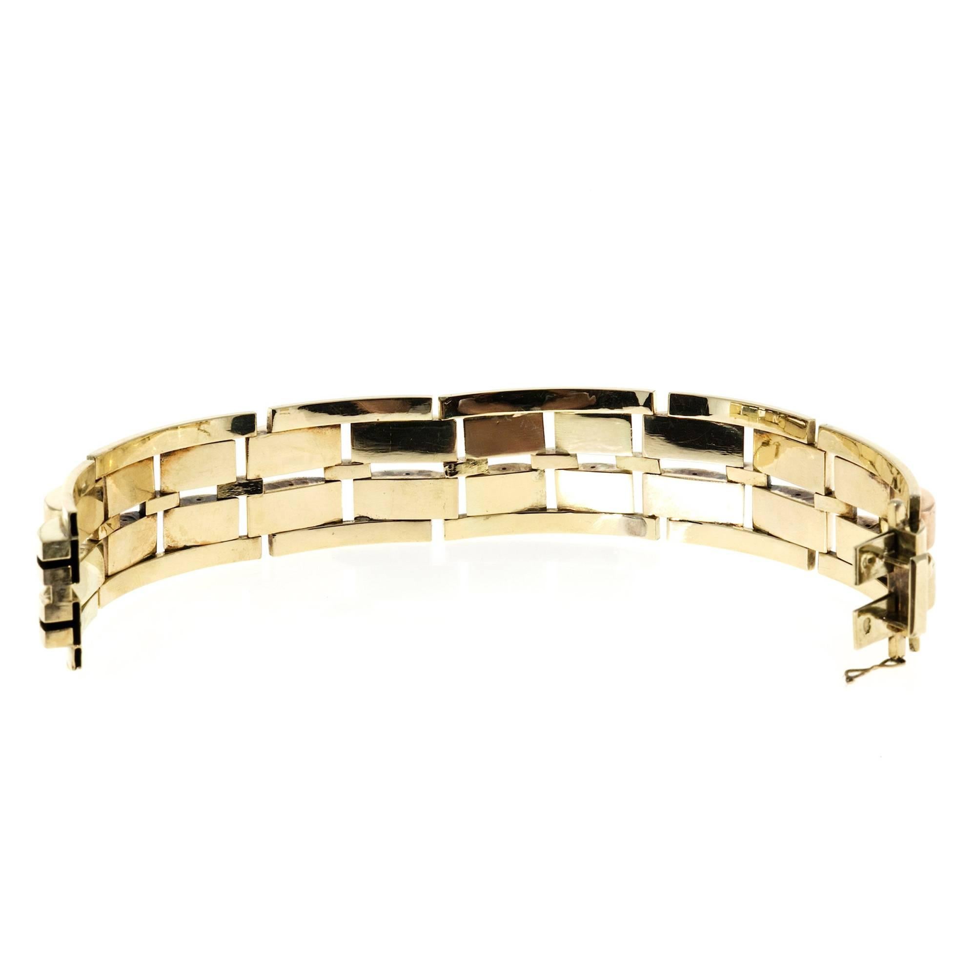 Retro Art Deco rose and green gold 1940-1950 bracelet.  

14k Rosw and green gold
Tested: 14k
41.0 grams
Bracelet length: 7.5 inches
Width: 23.97mm
Depth: 5.65mm
