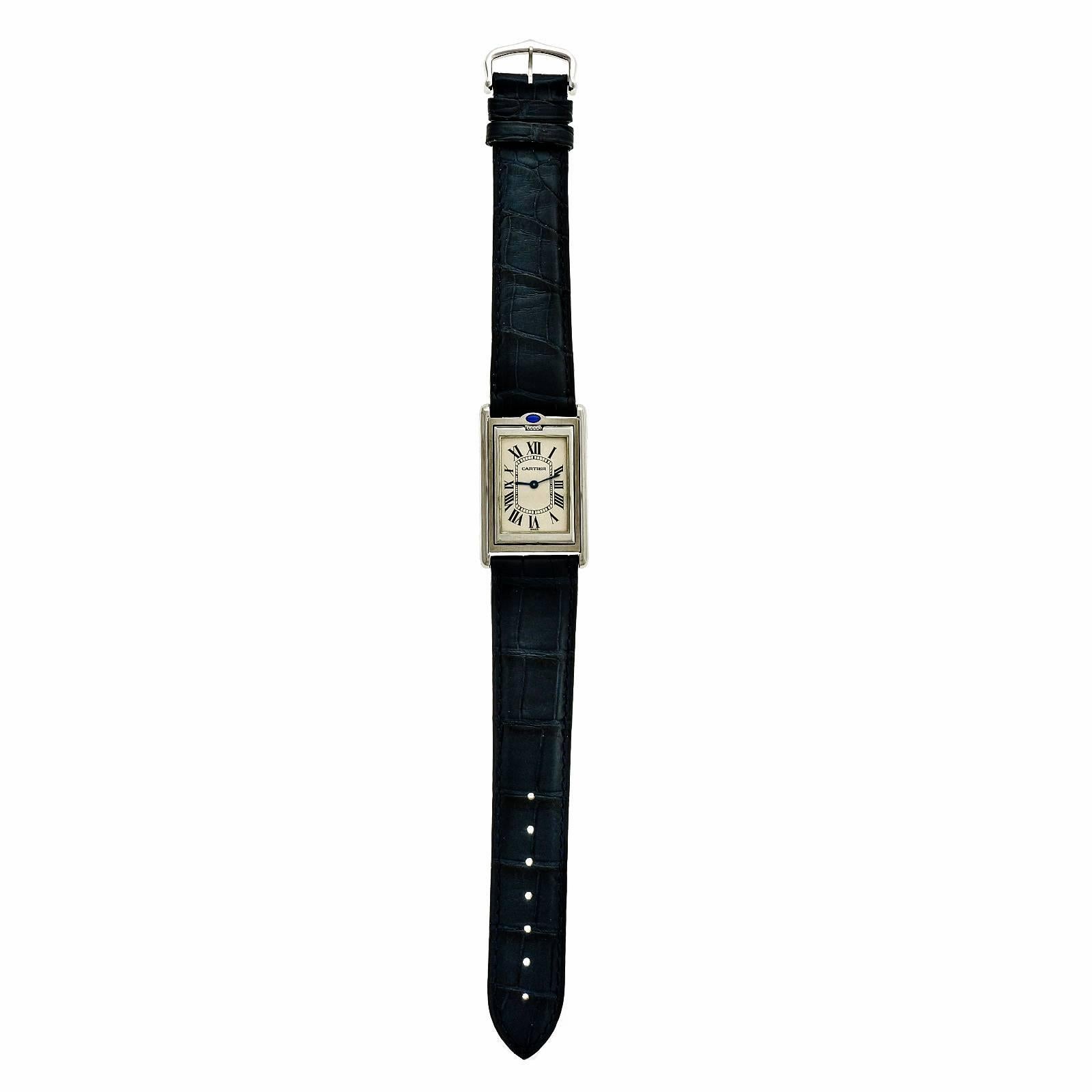 Cartier tank Basculante steel reversible wrist watch. Large size. Cartier Matt dark blue band. Reversible style W1011358

Stainless steel 
35 grams 
Length: 38.5mm 
Width: 25.5mm 
Band width at case: 20mm 
Case thickness: 5.9mm 
Band: