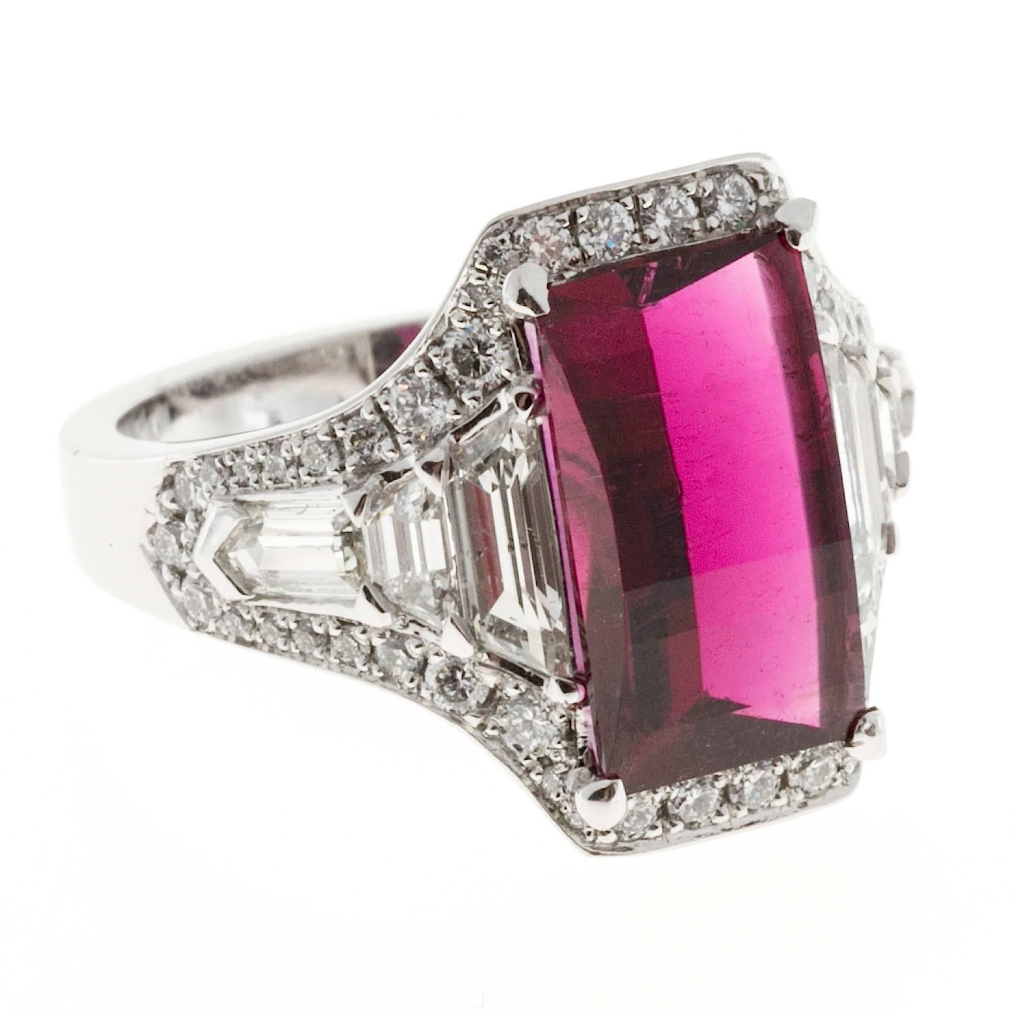 1935 Art Deco Rubellite red Tourmaline engagement ring. Rectangular faceted domed top stone deep red color. Gubelin lab could not determine heat. 

1 cushion cut custom cut pink red Tourmaline, approx. total weight 3.89cts, VS, 12.70 x 7.25 x