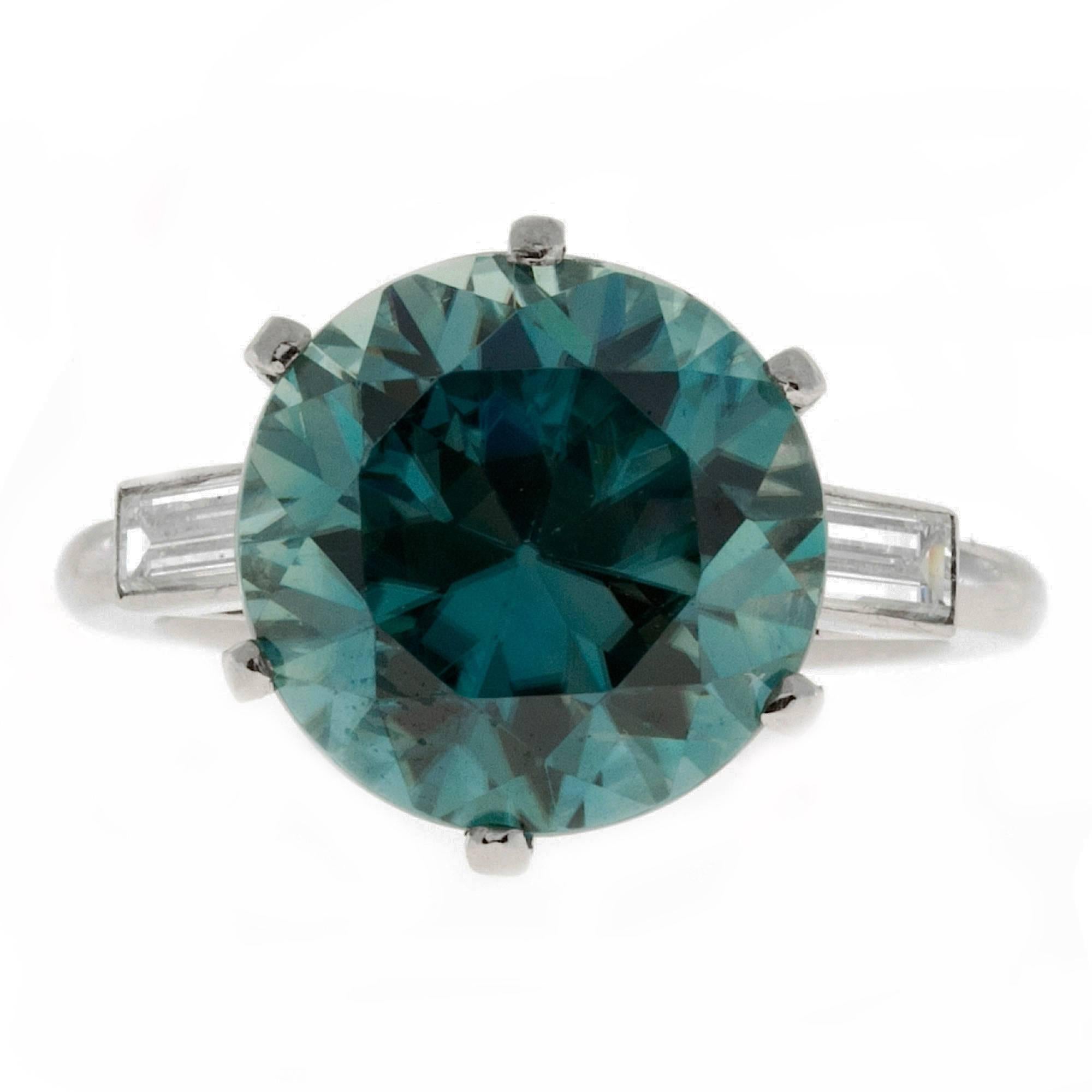 Handmade Platinum engagement ring with top gem blue zircon circa 1930. Side baguette diamonds old European cut. GIA certified. 
   
1 round bright blue green genuine Zircon, approx. total weight 11.29cts, VS, 12.44mm. GIA certificate # 2155274481  