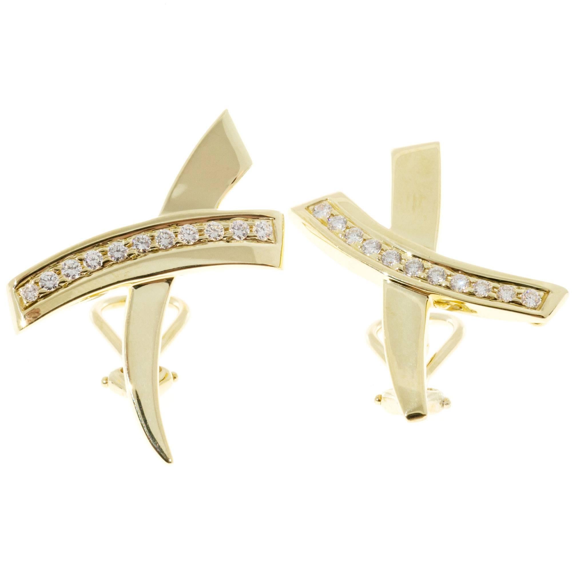 Paloma Picasso “X” design diamond earrings for Tiffany & Co from the Grafitti collection. Clip and post.

22 round diamonds approx. total weight .44cts, F, VS
18k yellow gold
Tested: 18k
Stamped: 750
11.9 grams
Hallmark: Tiffany & Co Paloma