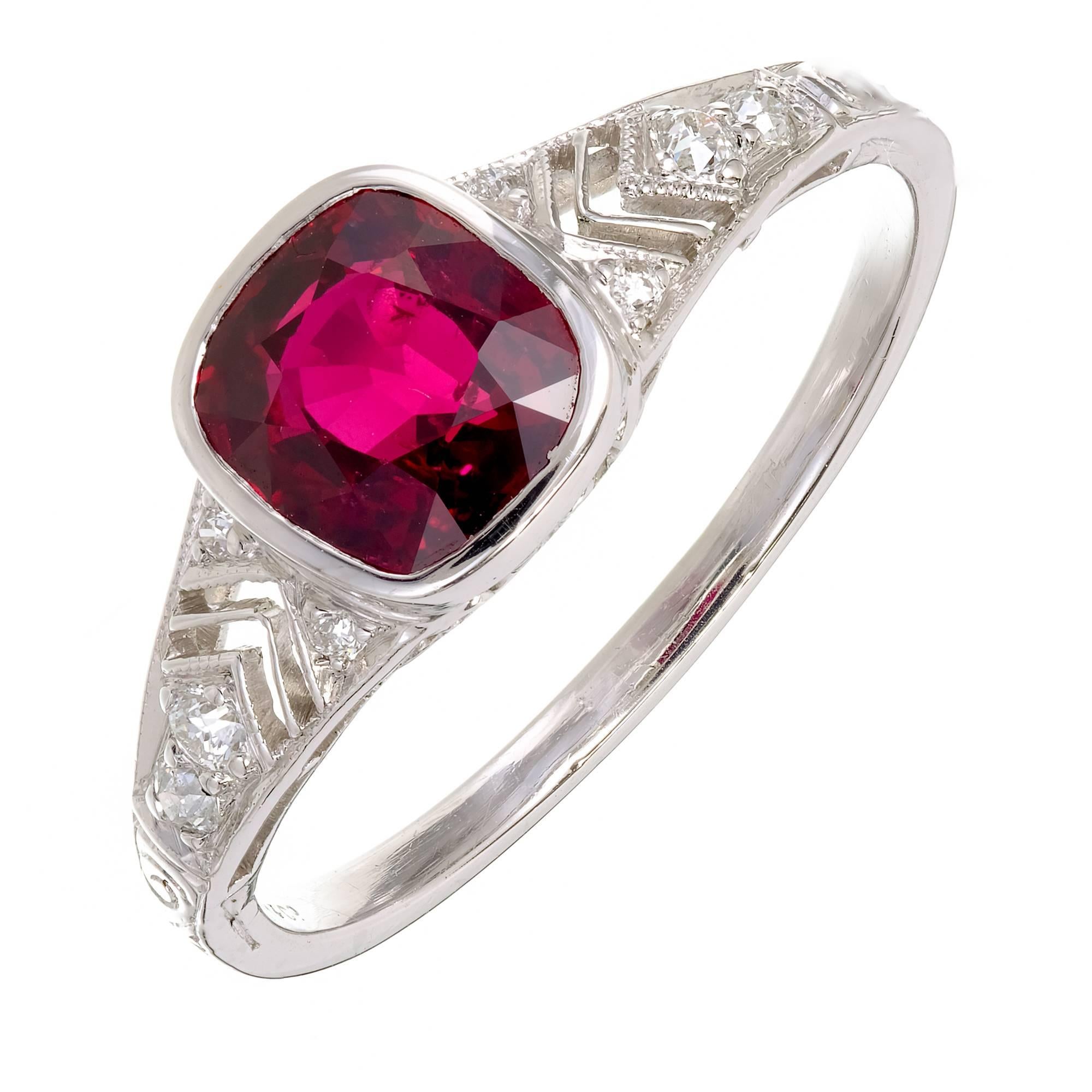 Original Tiffany & Co 1910-1919 handmade ruby and diamond Platinum engagement ring. Full cut European diamond side stones. Original natural no heat certified no enhancements pure red Ruby cushion cut center stone.
 
1 natural blood red cushion cut