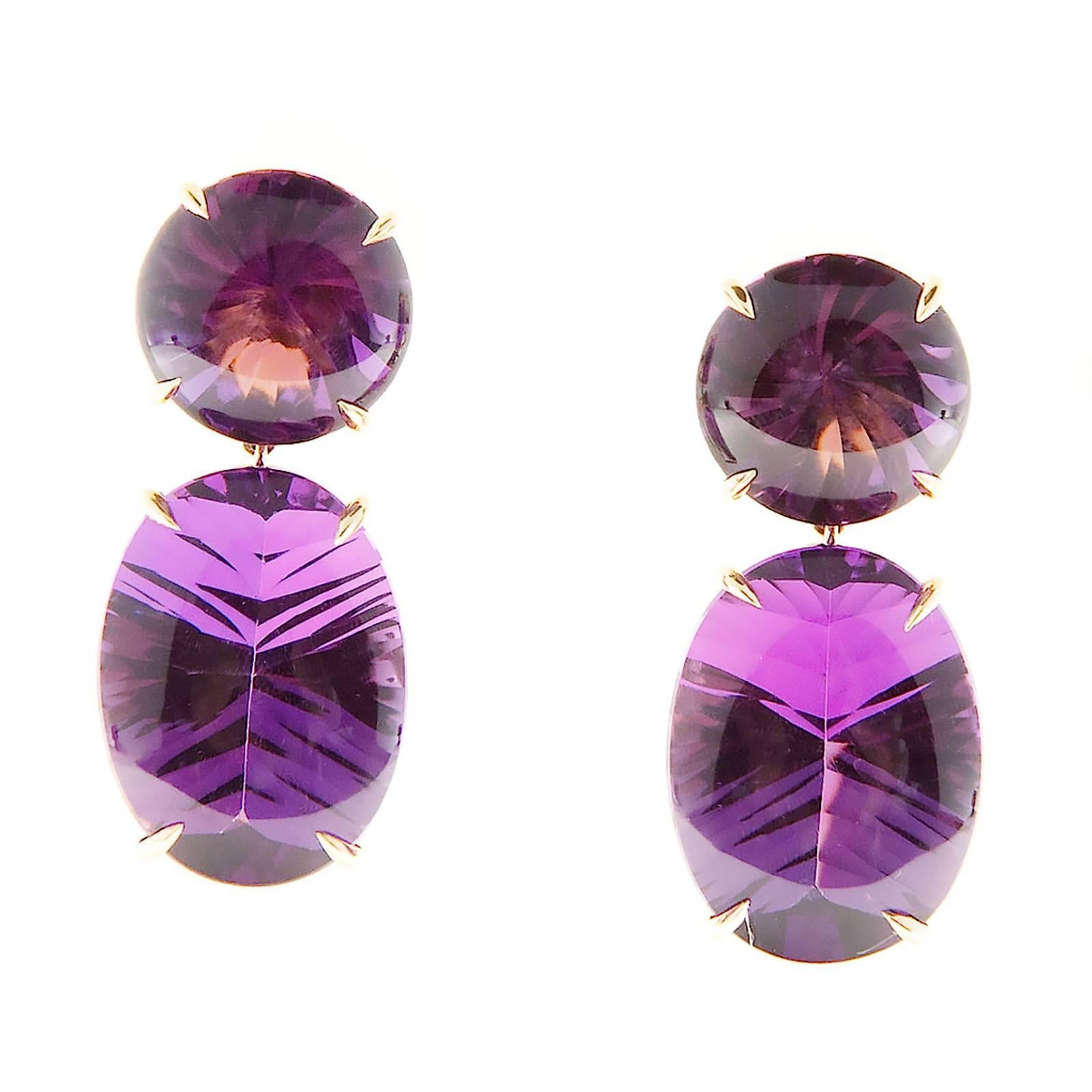 Custom top gem natural Amethyst Fantasy cut on the bottom for attractive sparkle. Earrings made in the Peter Suchy Workshop. 

2 round 13mm natural bright purple Amethyst, approx. total weight 13.79cts, VS, domed top Fantasy cut bottom
2 natural