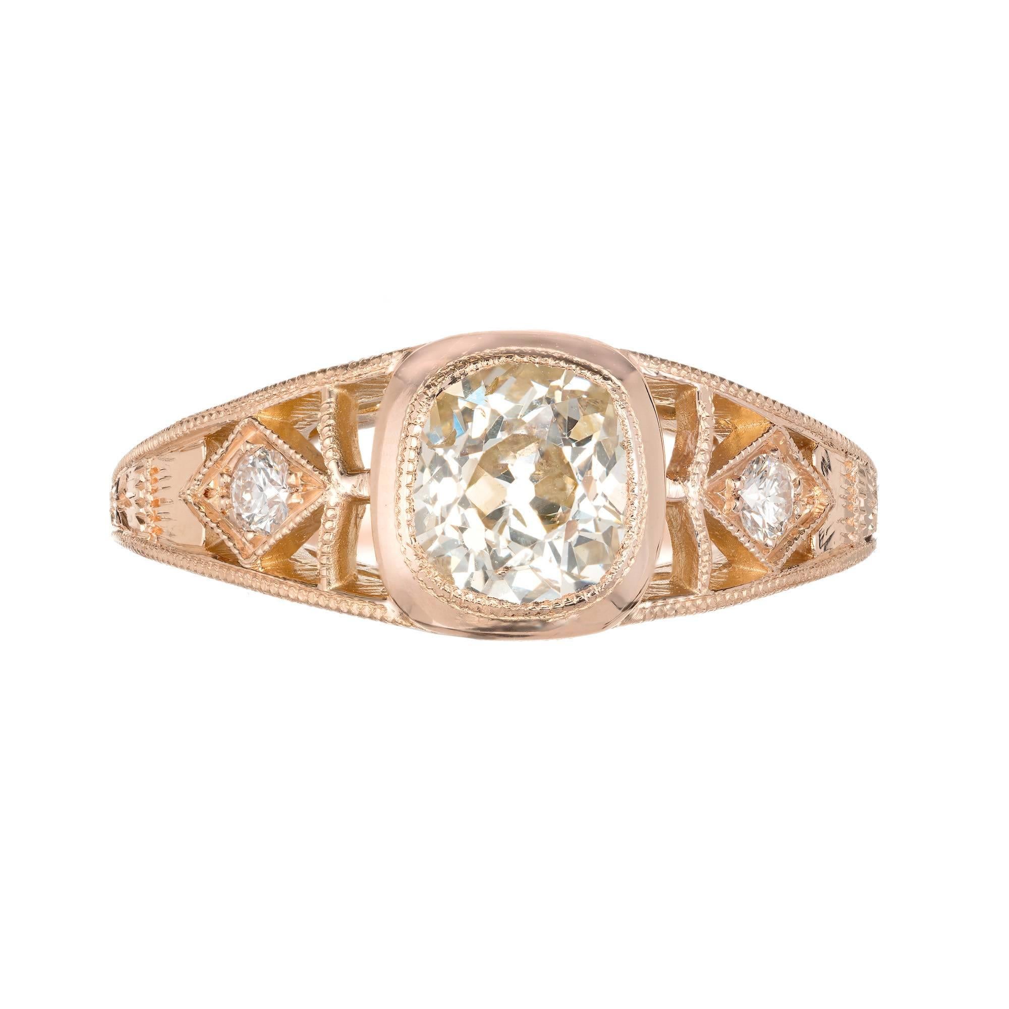 Peter Suchy 18k rose gold open filigree engagement ring with a 1.00ct old mine brilliant cut GIA certified diamond of warm soft light brown S to T color. The ring was made in our workshop using old world hand done detailing.  

1 old mine cushion