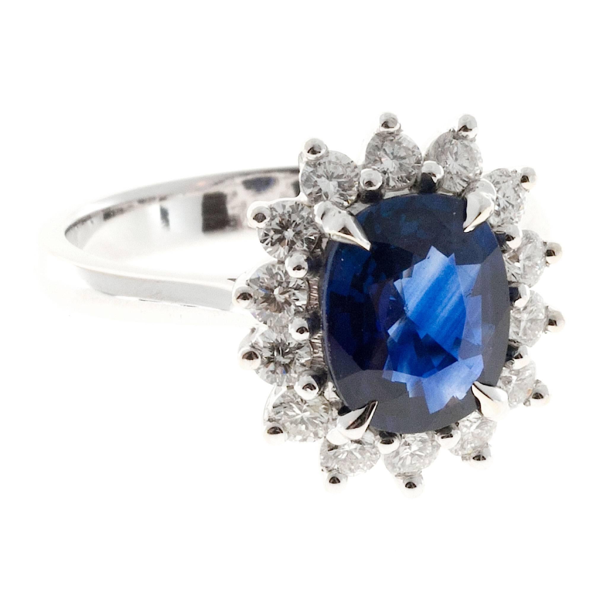 Bright Oval Royal blue sapphire with diamond halo crown. GIA certified simple heat only. Handmade white gold setting. Circa 1950

1 oval Royal blue Sapphire, approx. total weight 2.12cts, VS2 - SI1, 9 x 7.30 x 3.55mm, natural corundum simple heat
